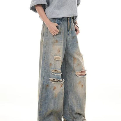 RIPPED STAINED DENIMS