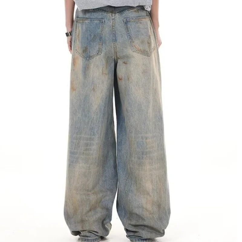 RIPPED STAINED DENIMS