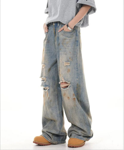 RIPPED STAINED DENIMS