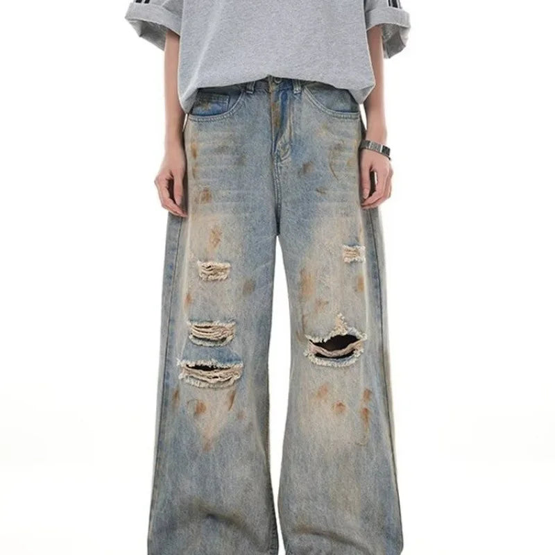 RIPPED STAINED DENIMS